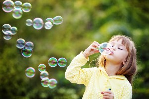 little girl with bubbles